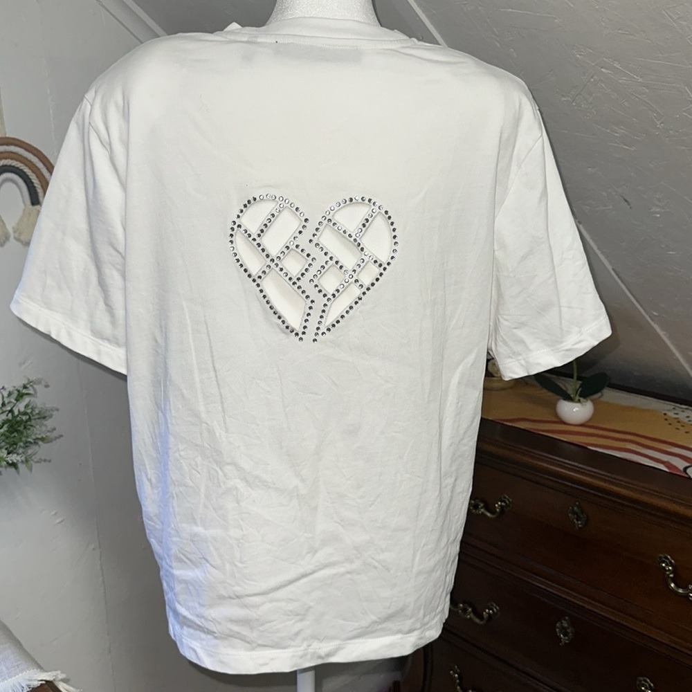 ROTATE White AJA Crew-Neck T-Shirt W/Cut-Out heart detail & padded shoulders